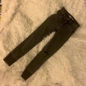 Distressed black denim